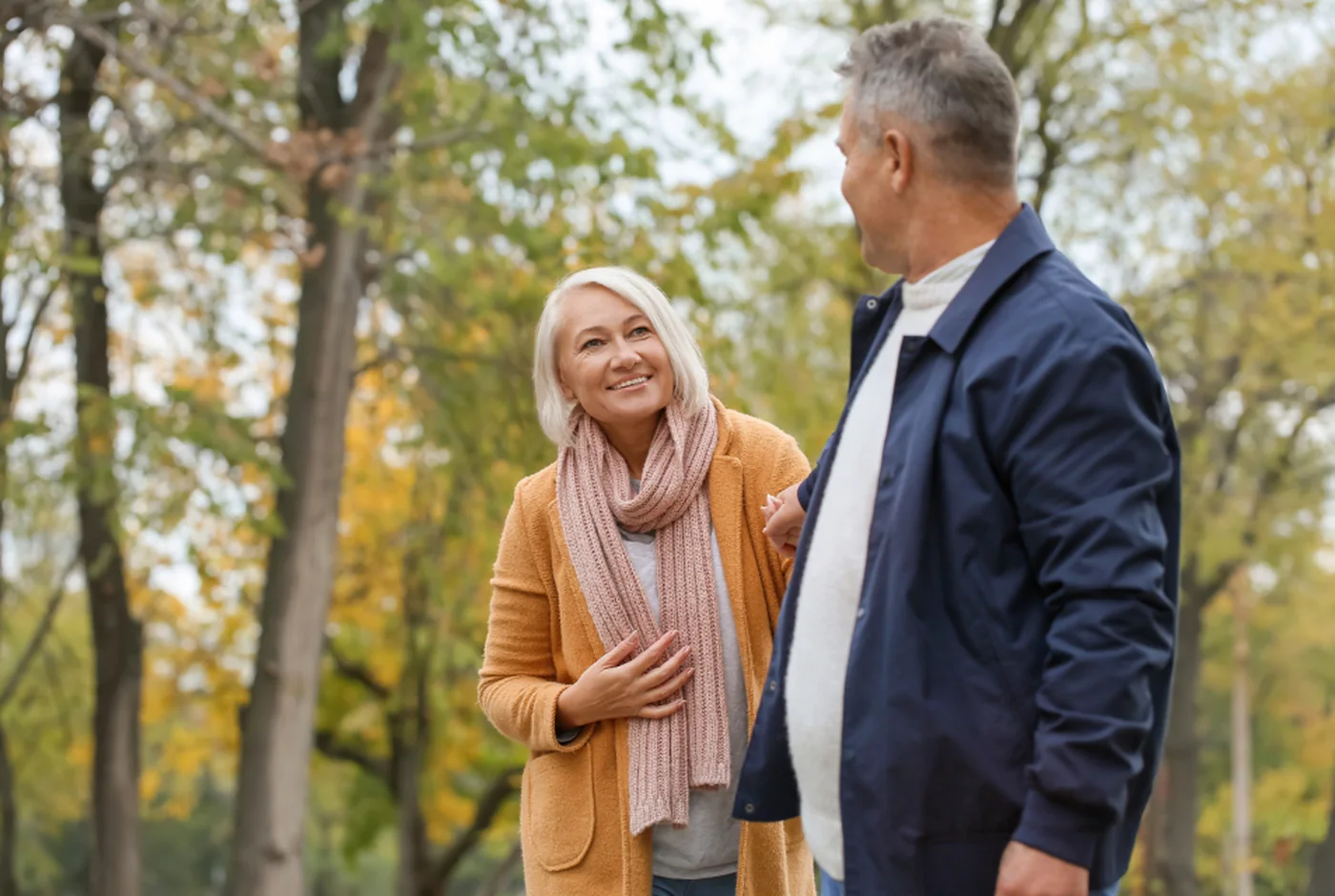A couple walking together on an autumn afternoon